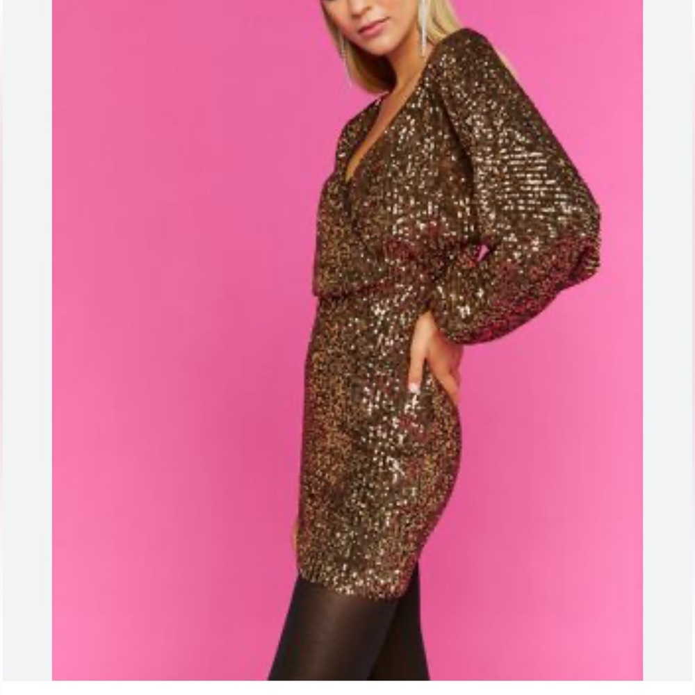 Forever 21 black and gold sequin long sleeve dress. Size large